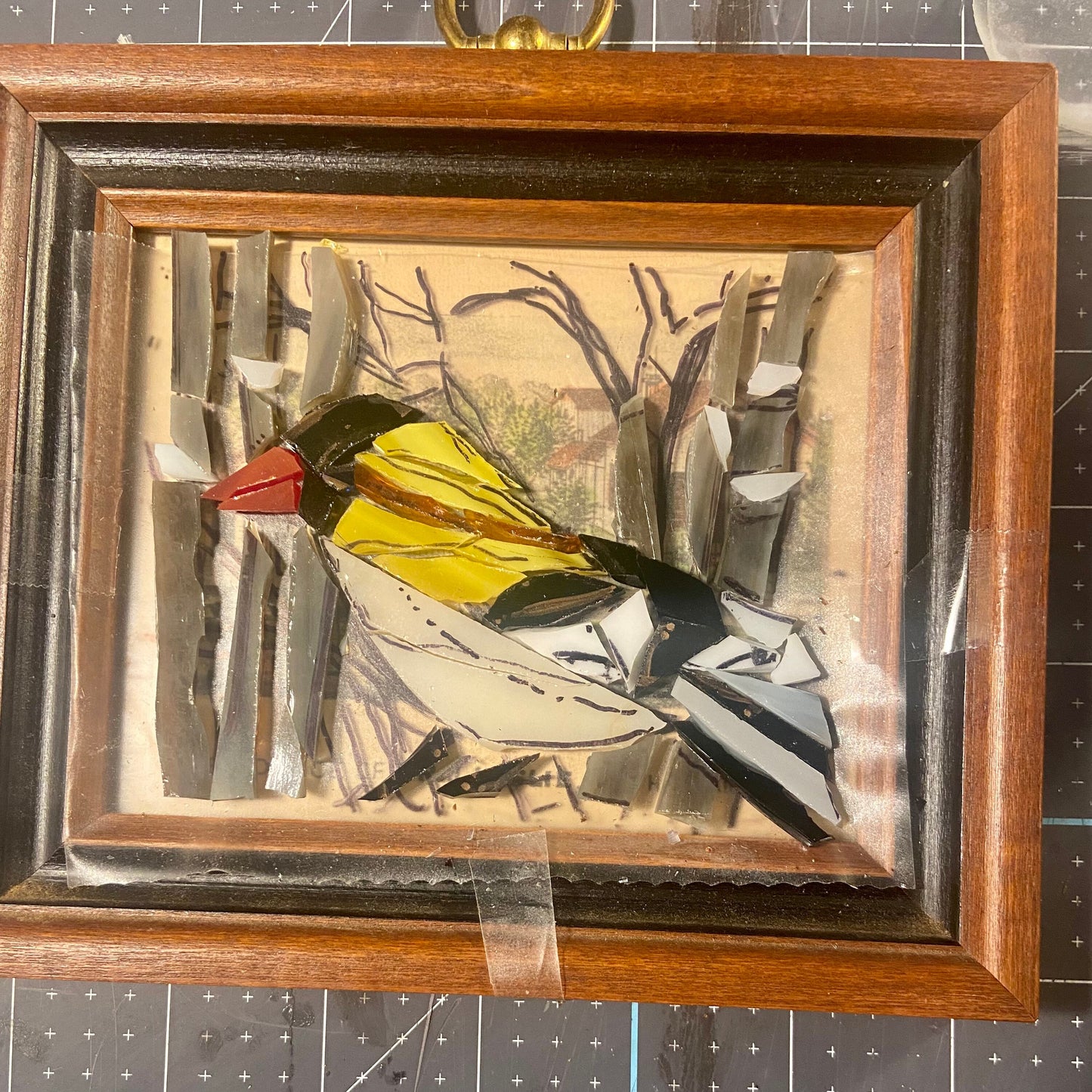 Handheld framed stained glass mosaic bird. Small 5"x5" Finch sitting on a tree branch. Gift for a bird watcher. Abstract bird wall art.