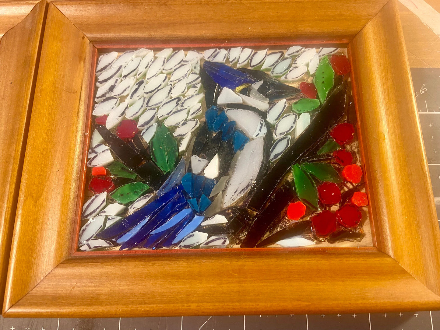 Stained glass mosaic bird. Small antique frame. Blue Jay sitting on a branch with red berries. Abstract bird artwork. Gift for bird watcher.