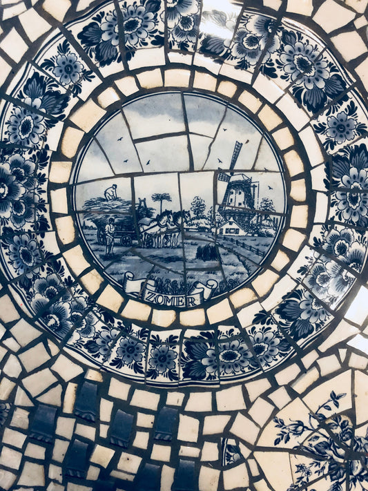 Mosaic cafe table on a wrought iron base. Blue Willow china. Broken Ceramic tiles.  Gift idea for garden lover.